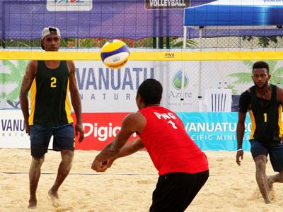 PNG's Moha Mea and Richard Kilarupa taking on Solomon Islands in their first match of the tournament.