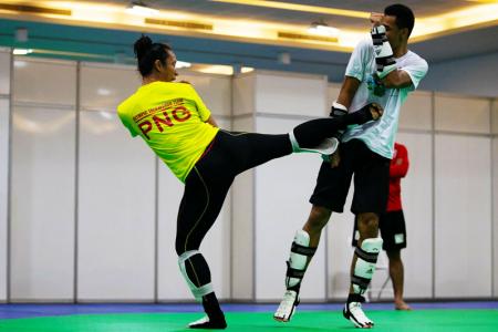 Samantha Kassman puts Maxemillion's defense to the test during training in Rio. PHOTO: J. Pini/ Team PNG.