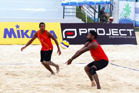 PNG's Moha Mea and Richard Kilarupa taking on Solomon Islands in their first match of the tournament.