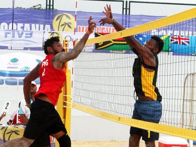 PNG's Moha Mea and Richard Kilarupa taking on Solomon Islands in their first match of the tournament.