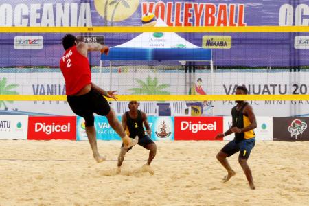 PNG's Moha Mea and Richard Kilarupa taking on Solomon Islands in their first match of the tournament.